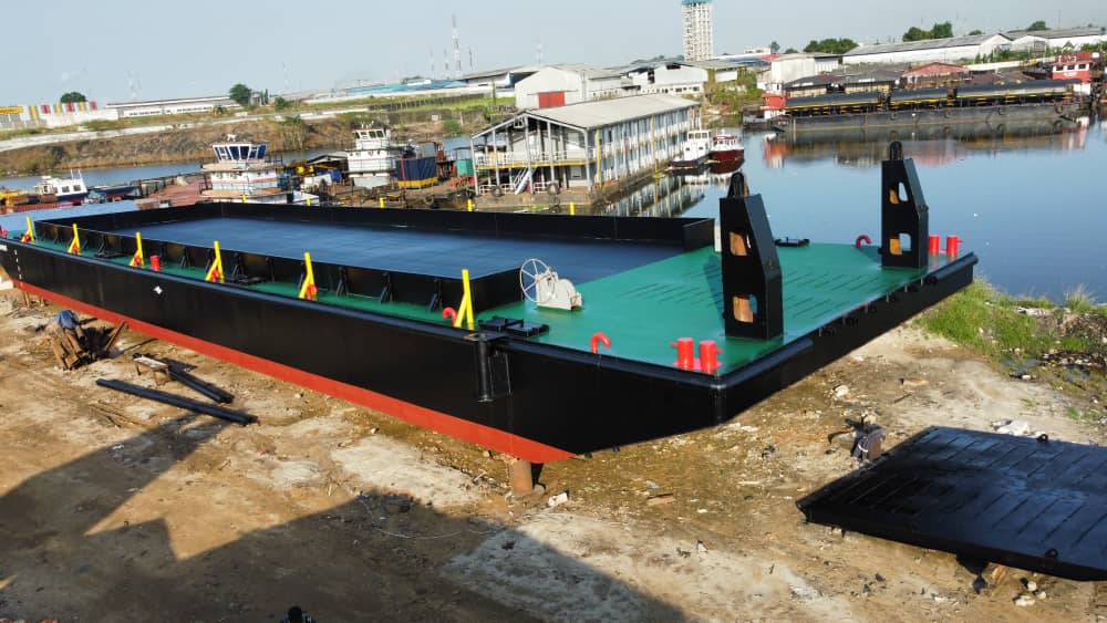 Barge at work on waterway