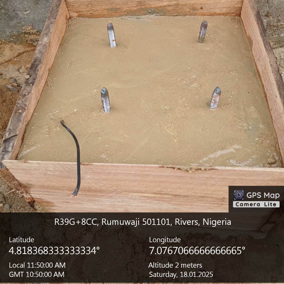 Finished pole foundation with anchor bolts